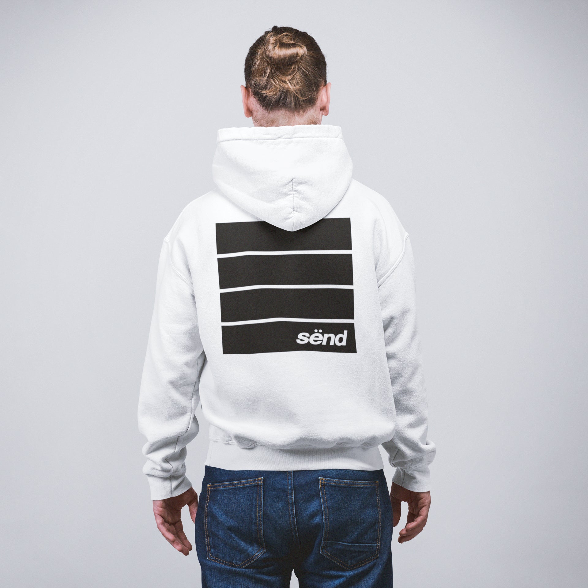 A blond dirtbike rider wearing a white hoodie with a large graphic backprint